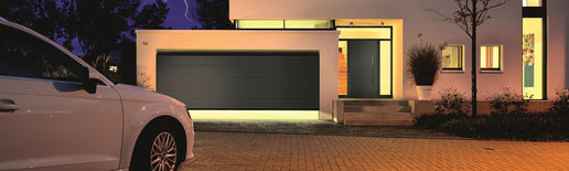 black sleek electric garage door 